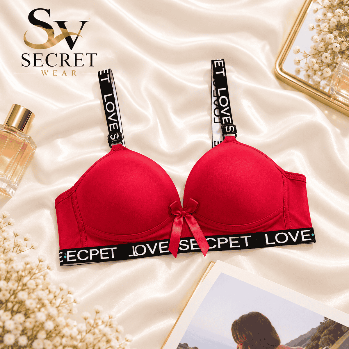 Love Secret Padded Bra in vivid red with smooth contoured cups, black LOVE-print straps and band, and a satin bow.